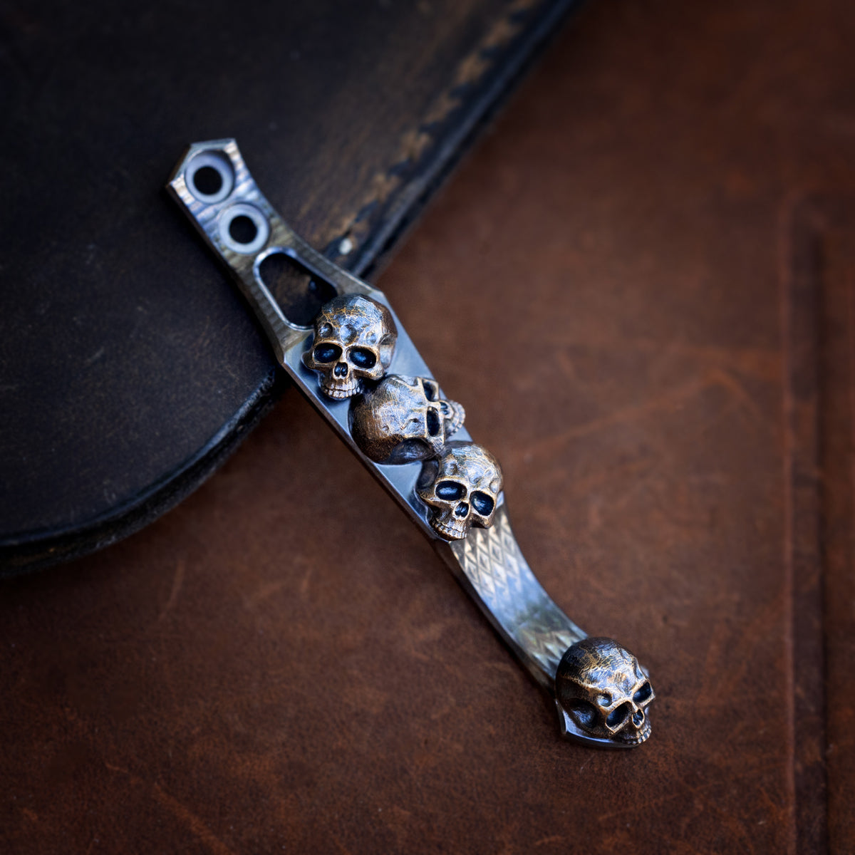 Steel Flame x Ti2 -- 2 Hole Mini Pile of Skulls – Ti2 Design